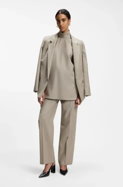 Sleeveless tailored blouse in virgin wool with stretch
