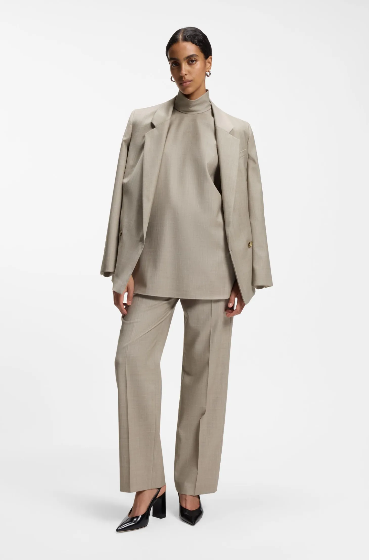 Sleeveless tailored blouse in virgin wool with stretch
