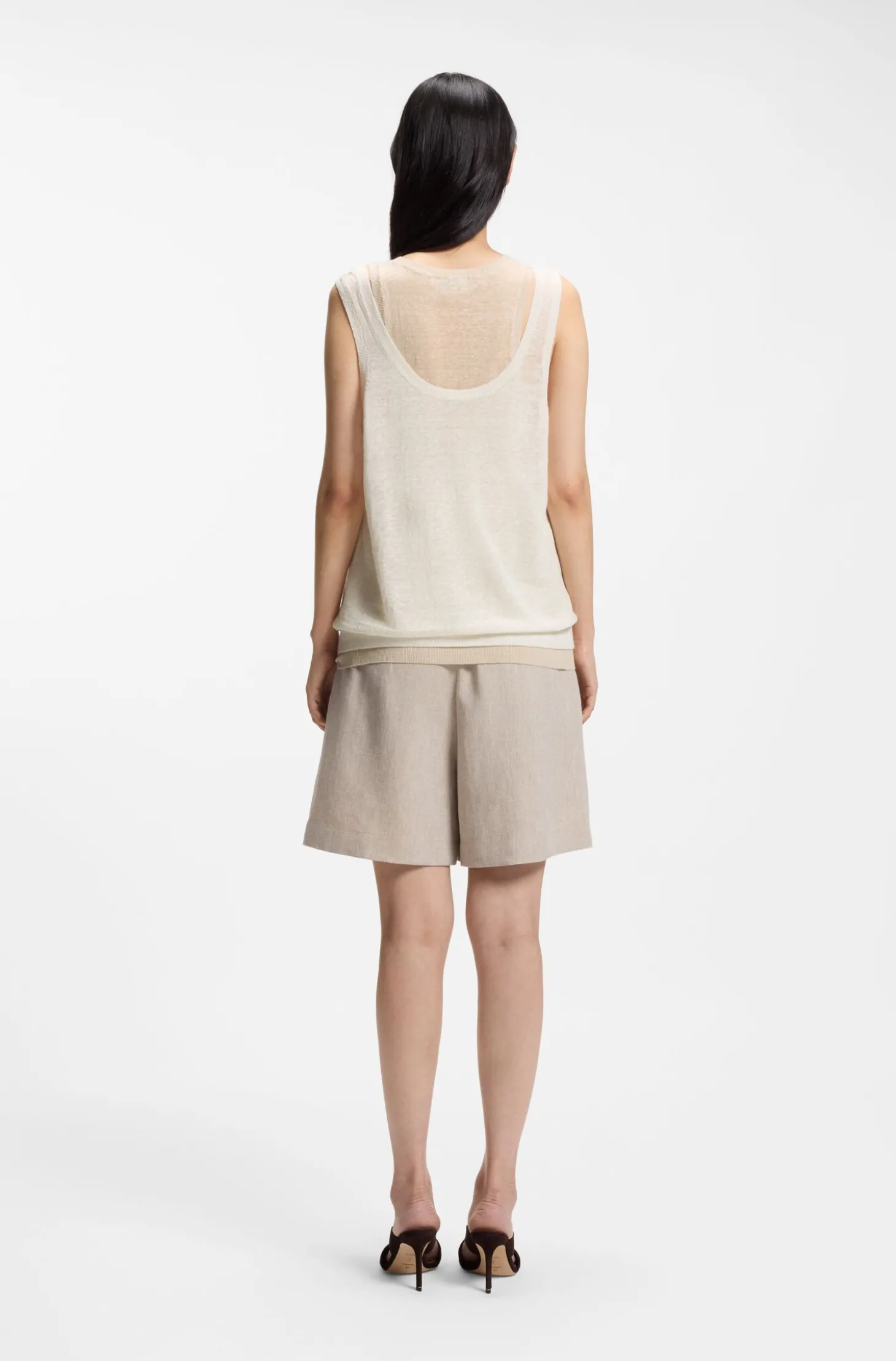 Sleeveless top in linen and cotton with layered design