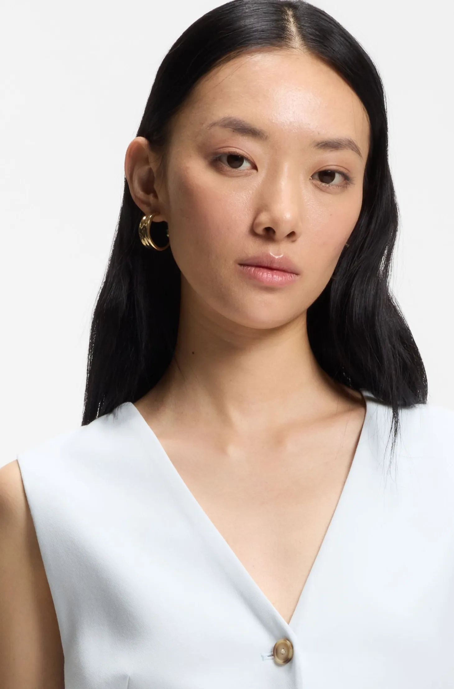 Slim-fit blazer with sleeveless styling
