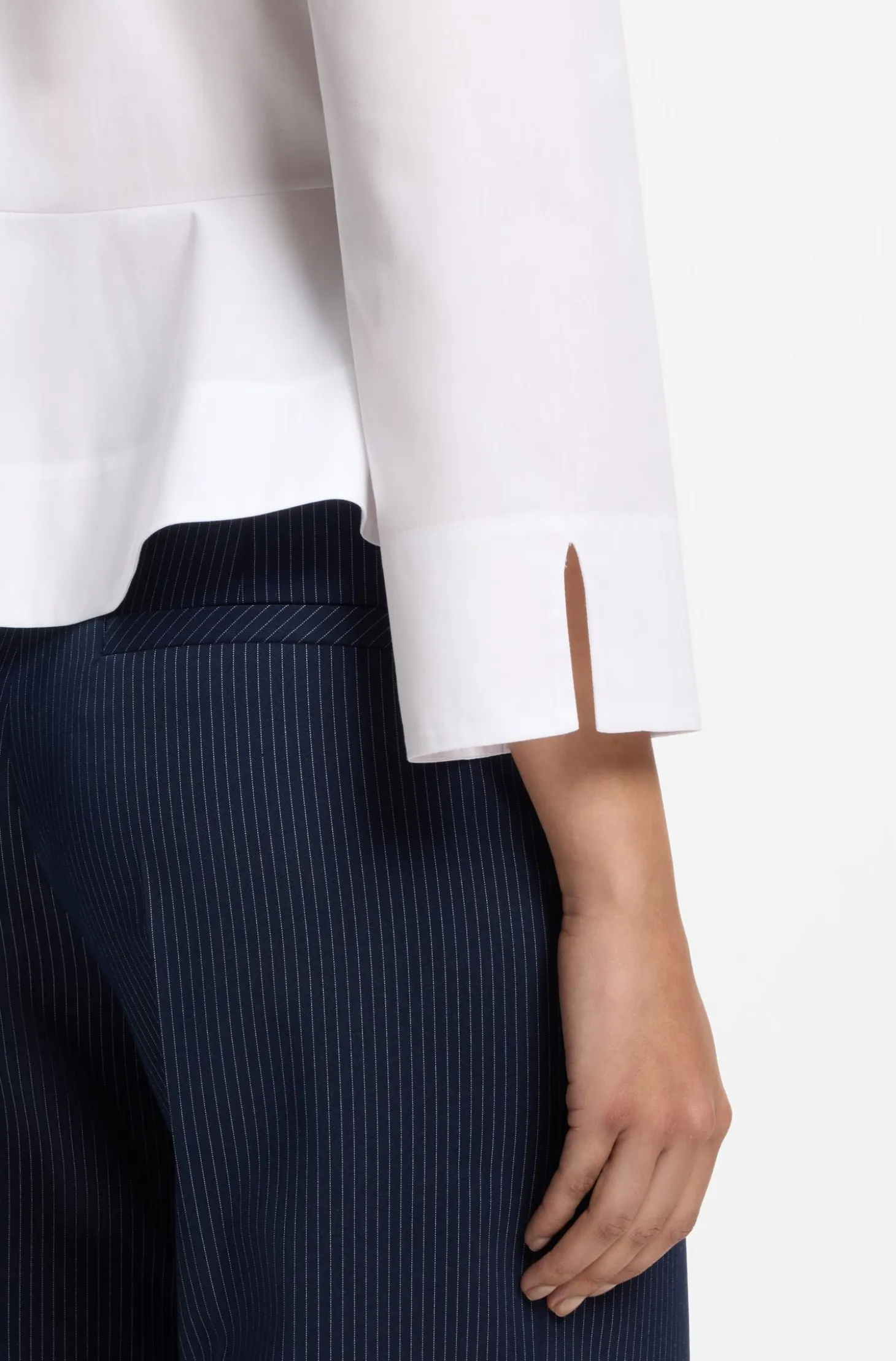 Slim-fit blouse in cotton with peplum hem