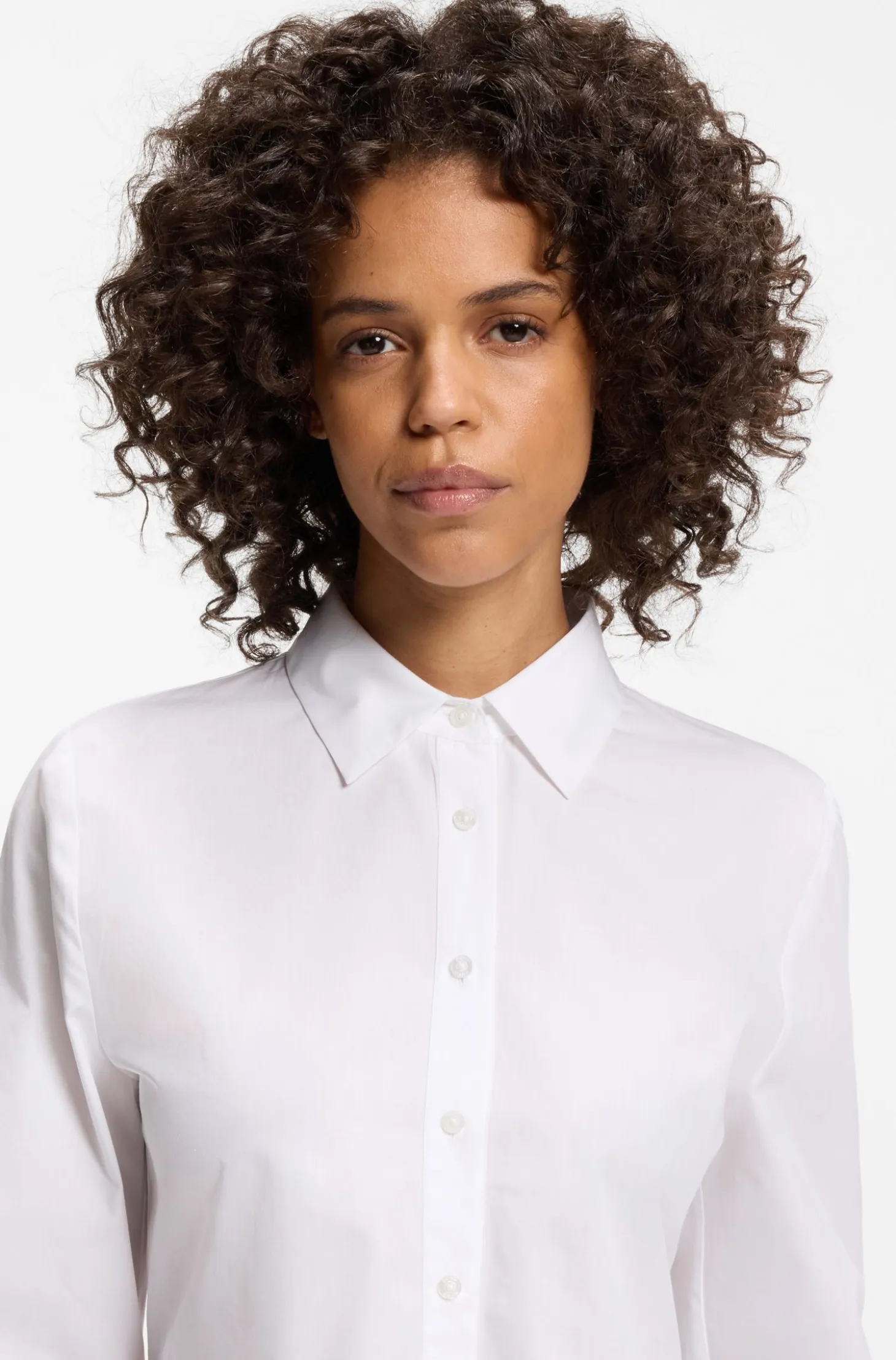 Slim-fit blouse in cotton with peplum hem