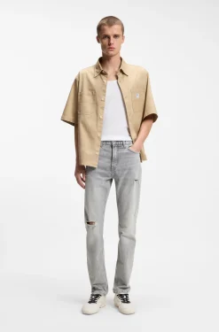Slim-fit jeans in distressed grey denim