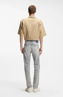 Slim-fit jeans in distressed grey denim