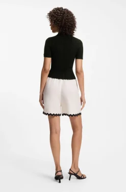 Slim-fit ribbed sweater with polo collar