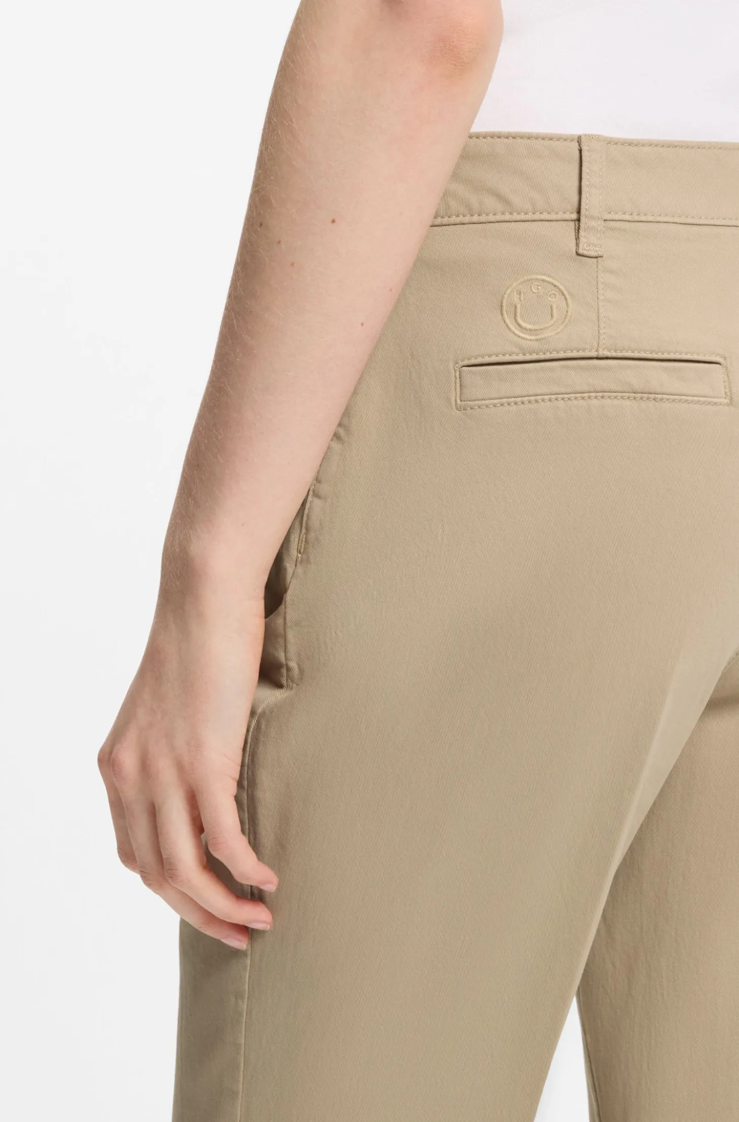Slim-fit trousers with flared leg