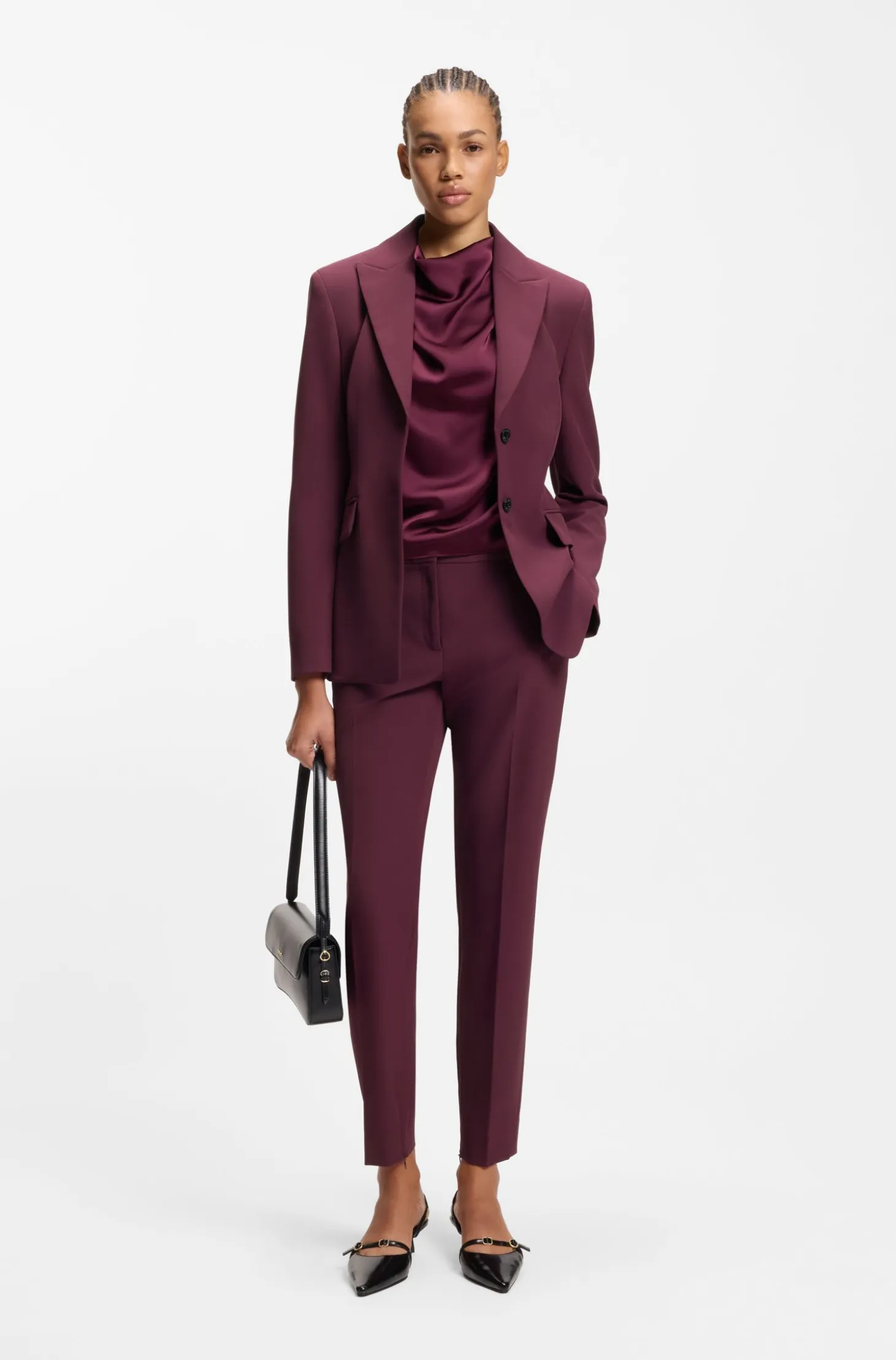 Slim-fit trousers with zip hems