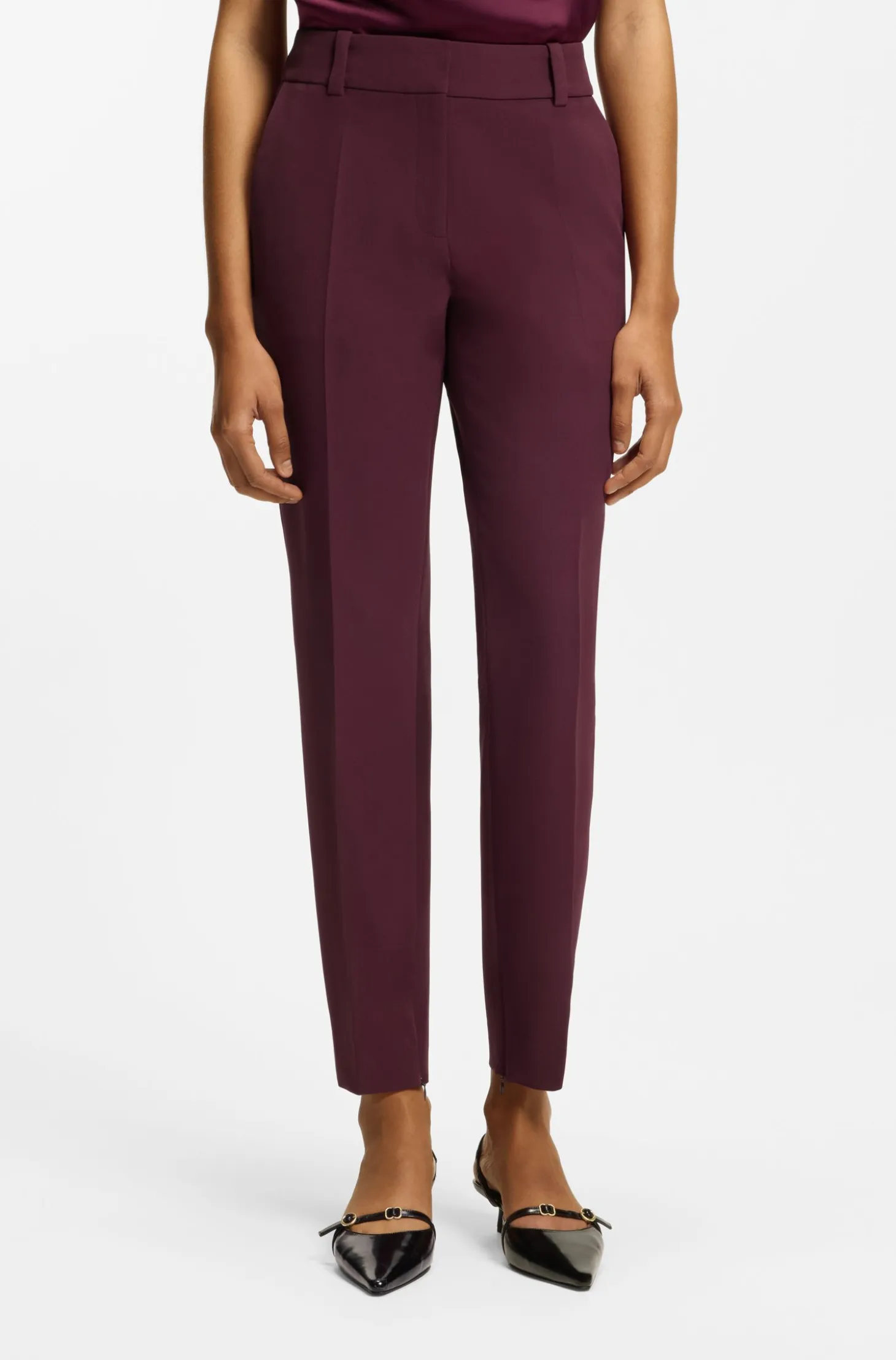 Slim-fit trousers with zip hems