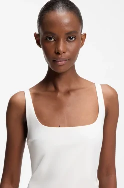 Square-neck dress with golden chain belt