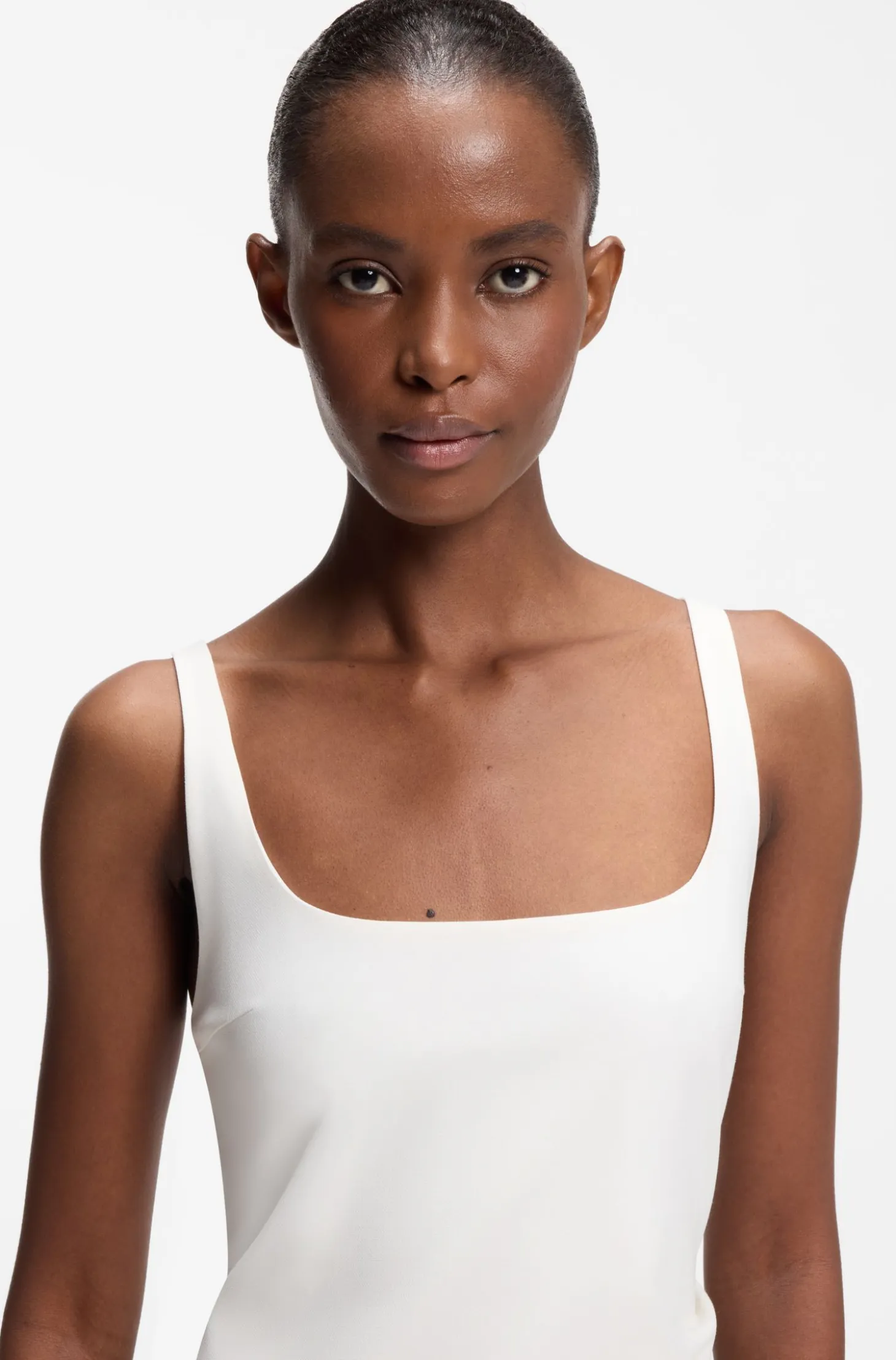 Square-neck dress with golden chain belt