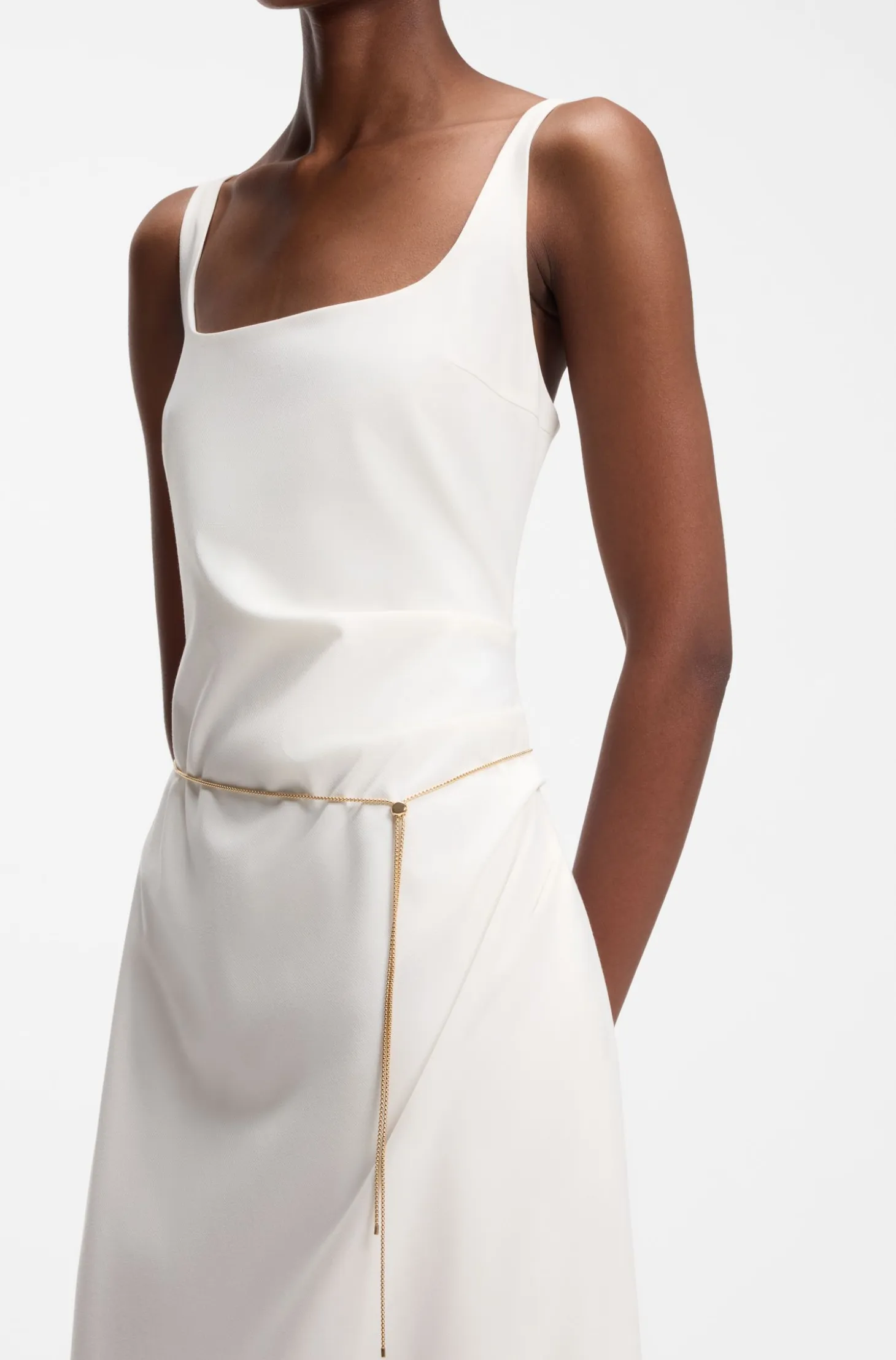 Square-neck dress with golden chain belt