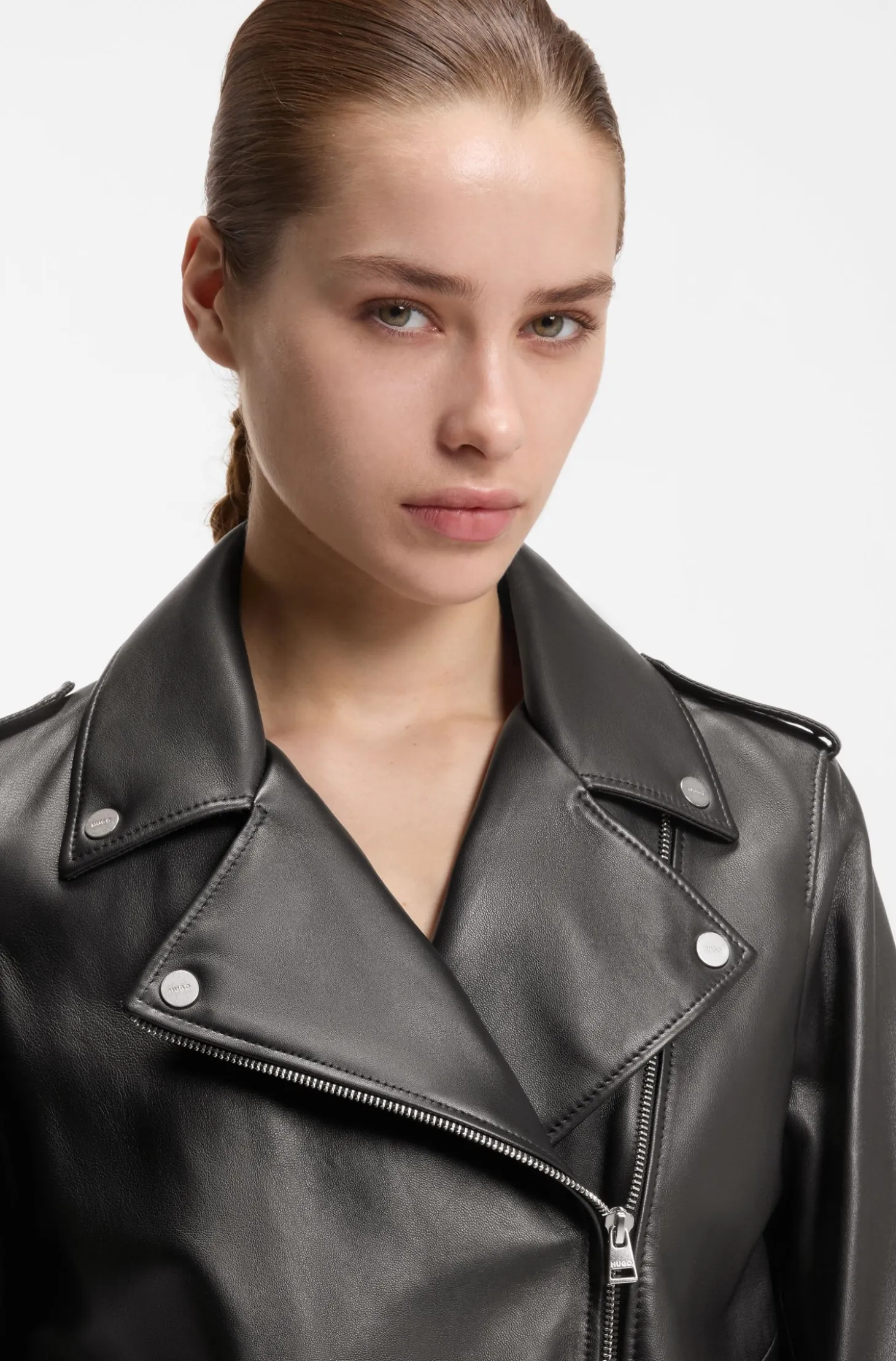 Straight-fit biker jacket in leather with zipped details