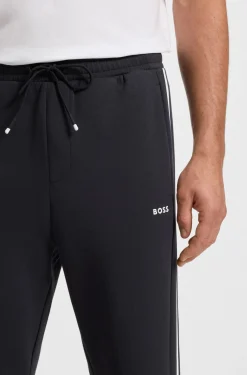 Stretch-cotton tracksuit bottoms with stripe insert