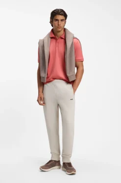 Striped-trim polo shirt in interlock cotton