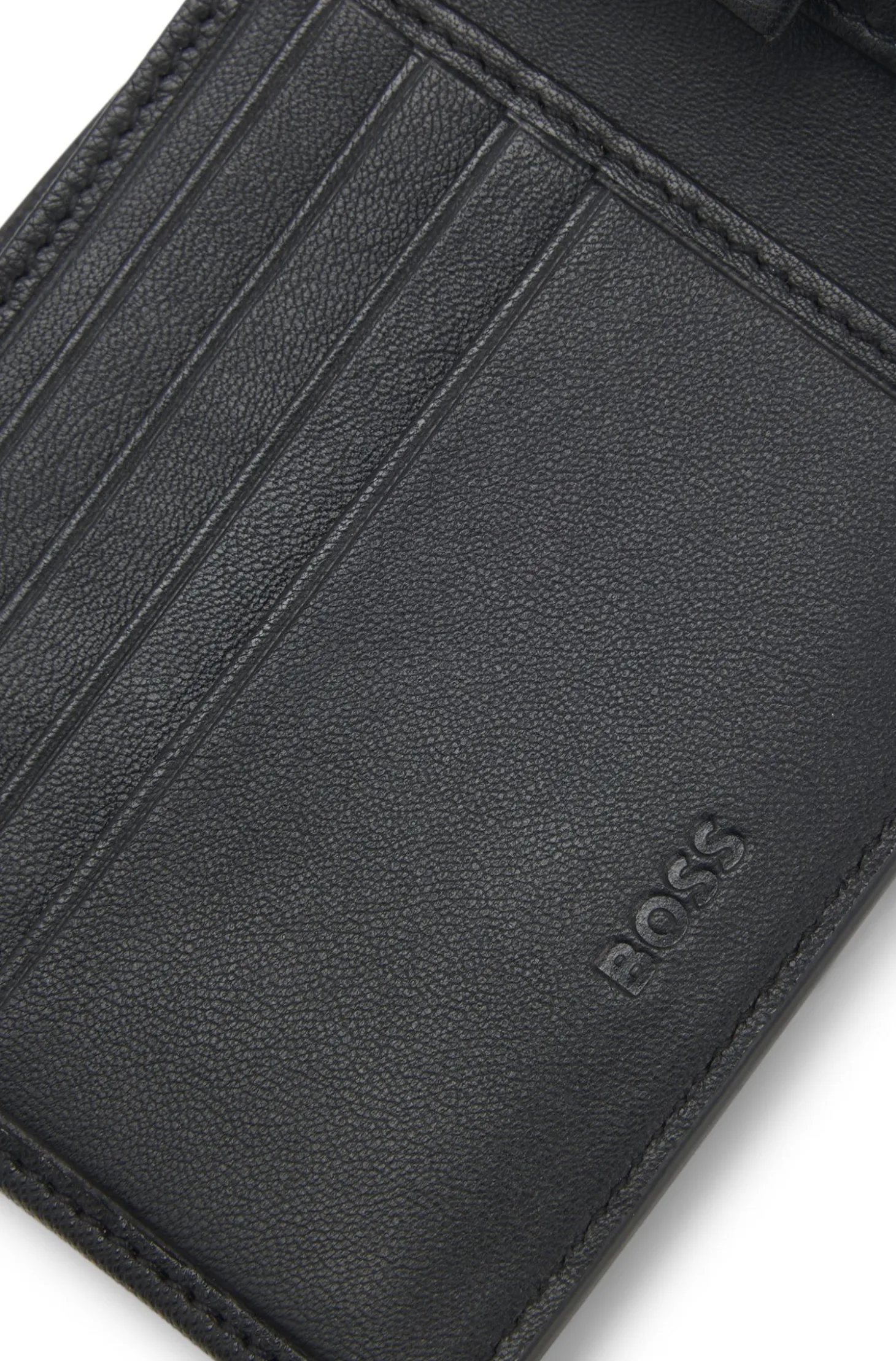 Structured folding wallet with metal logo lettering