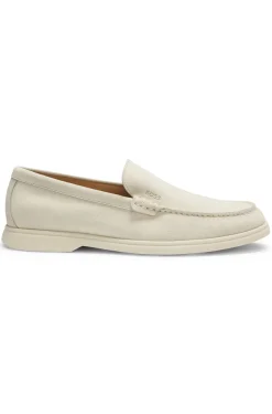 Suede loafers with embossed logo