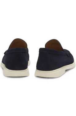 Suede loafers with embossed logo