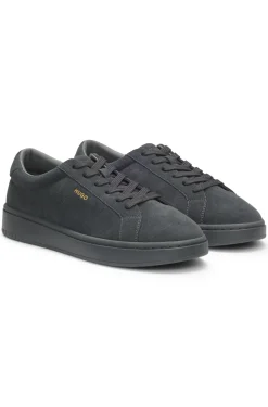 Suede trainers with gold-tone foil logo