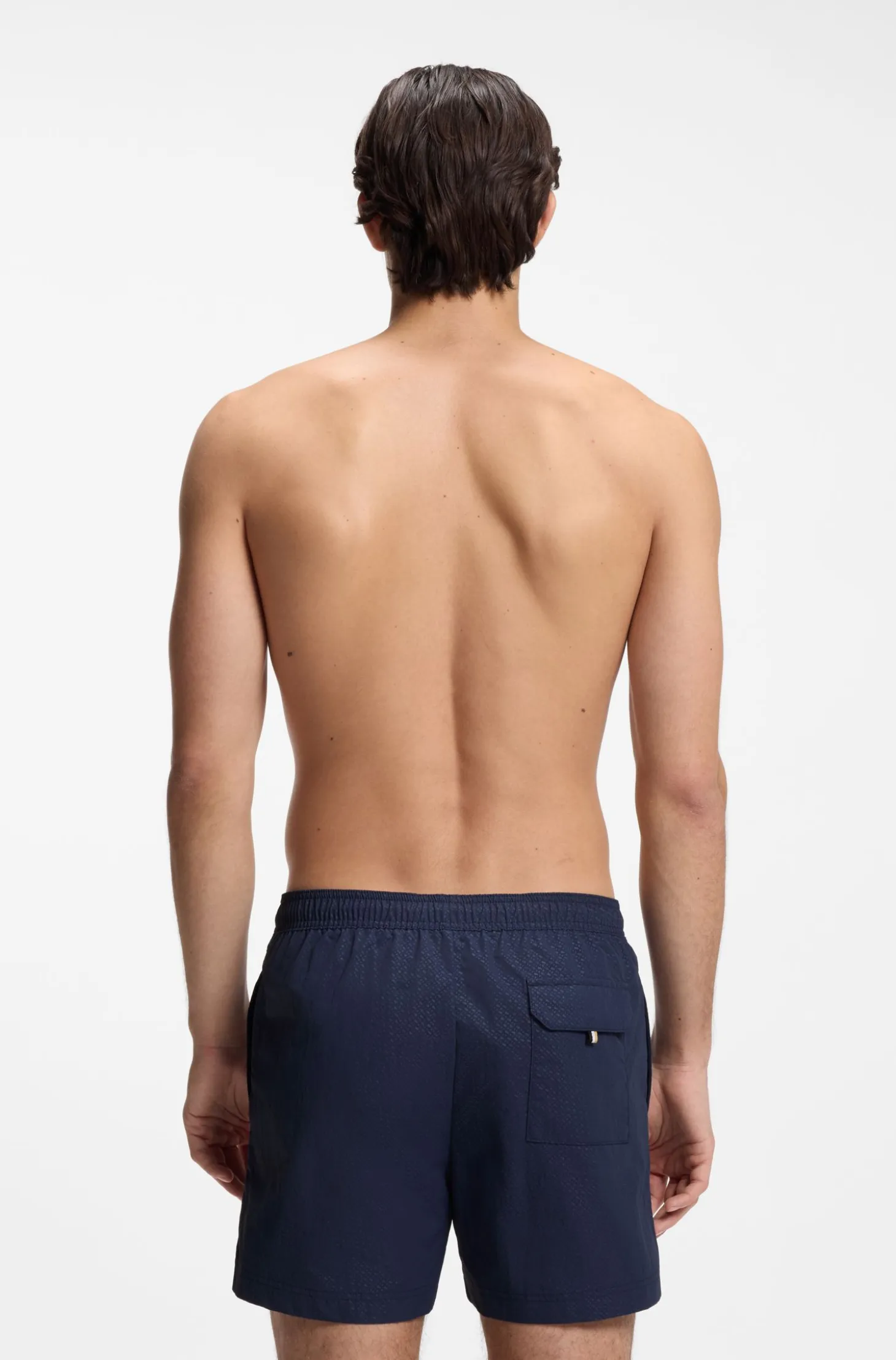 Swim shorts with all-over monogram print