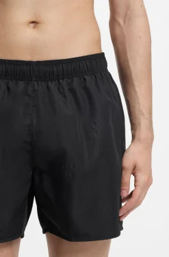 Swim shorts with all-over stacked logos