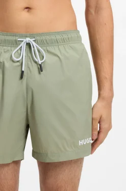 Swim shorts with contrast logo print