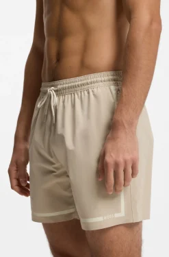 Swim shorts with logo stripe print