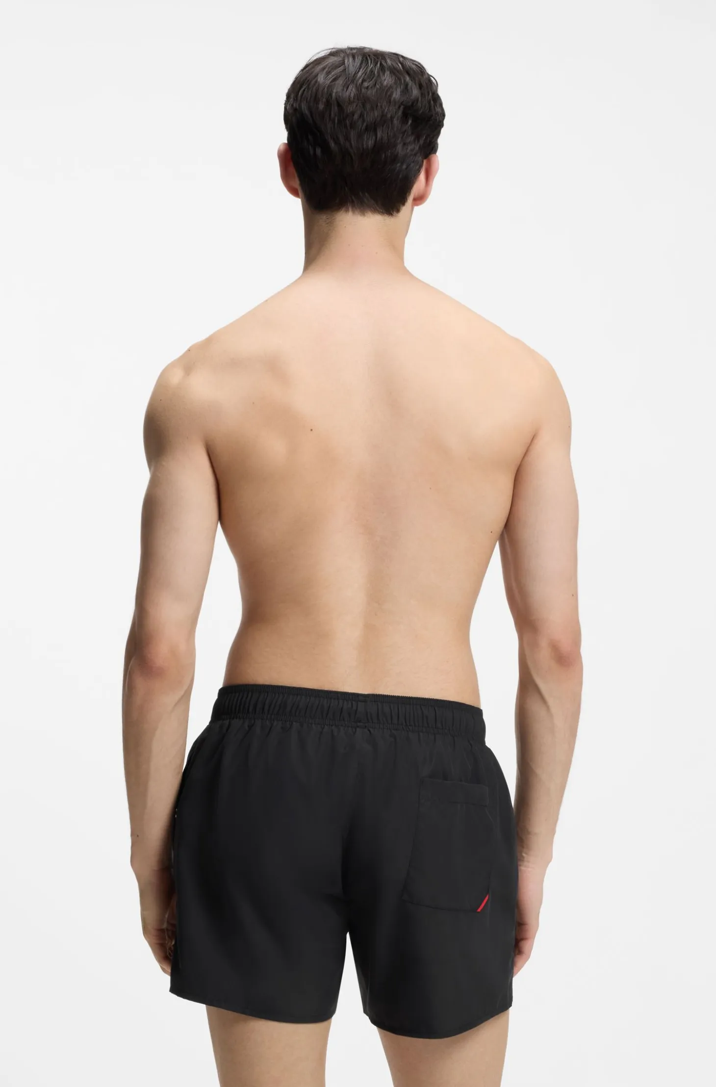 Swim shorts with repeat logos