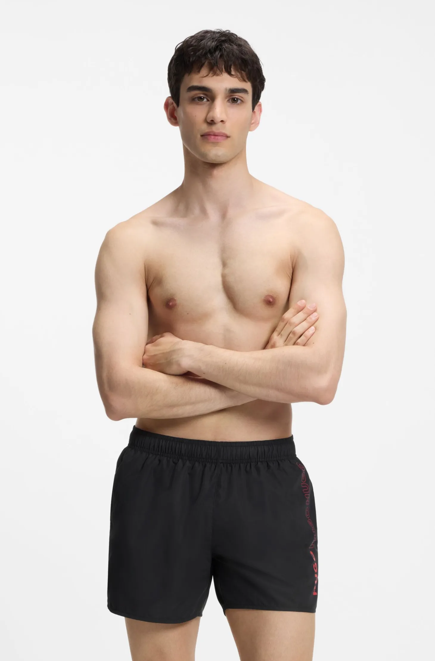 Swim shorts with repeat logos