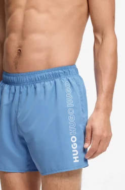 Swim shorts with repeat logos