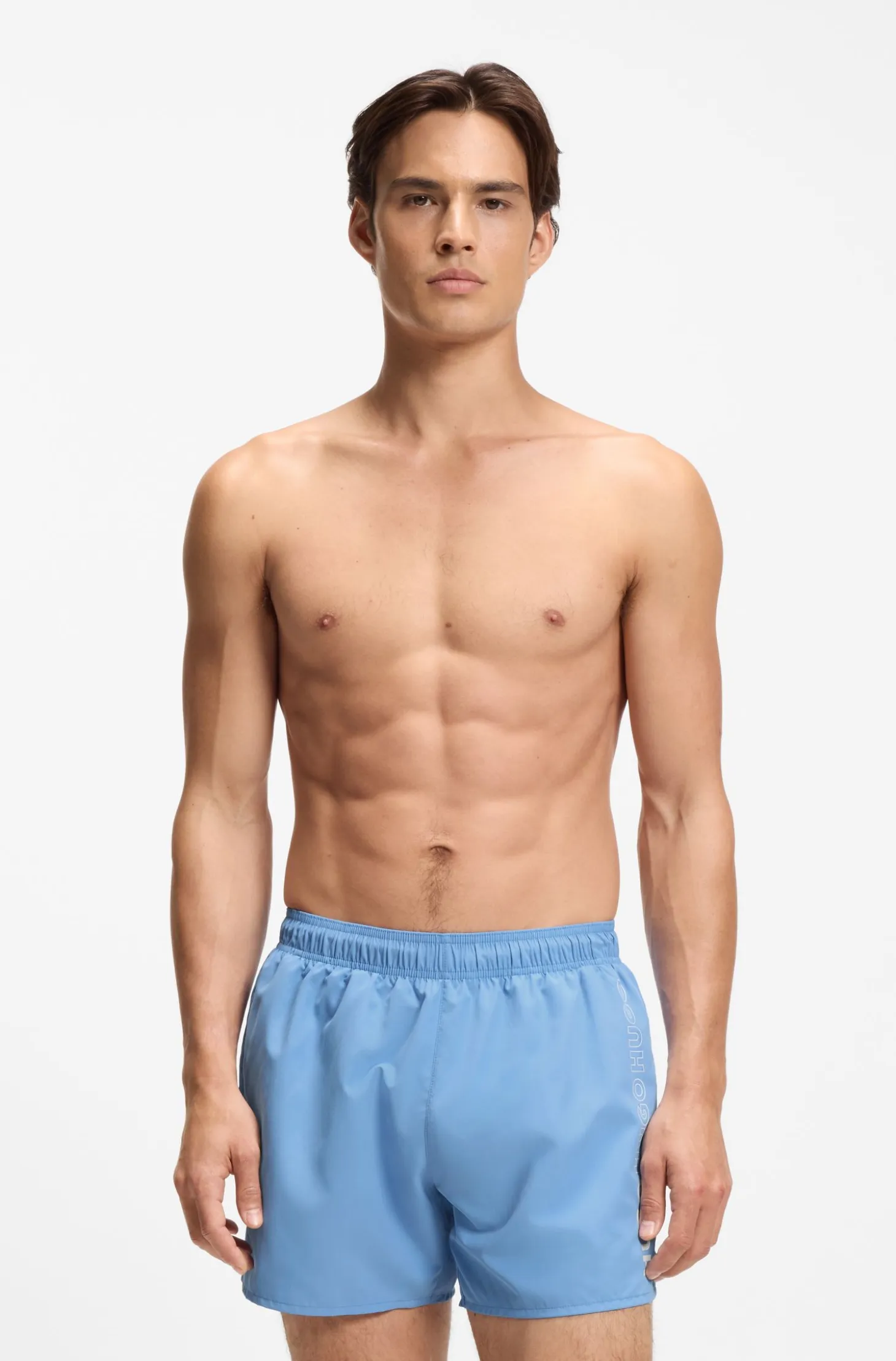 Swim shorts with repeat logos