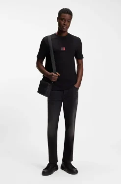 Tapered-fit jeans in black stretch denim