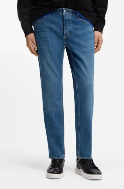 Tapered-fit jeans in mid-blue stretch denim