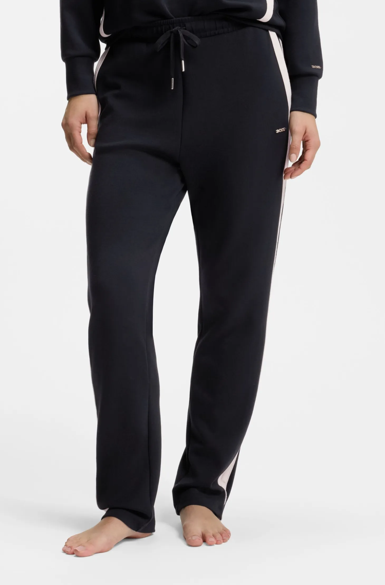 Tapered-fit tracksuit bottoms with contrast inserts