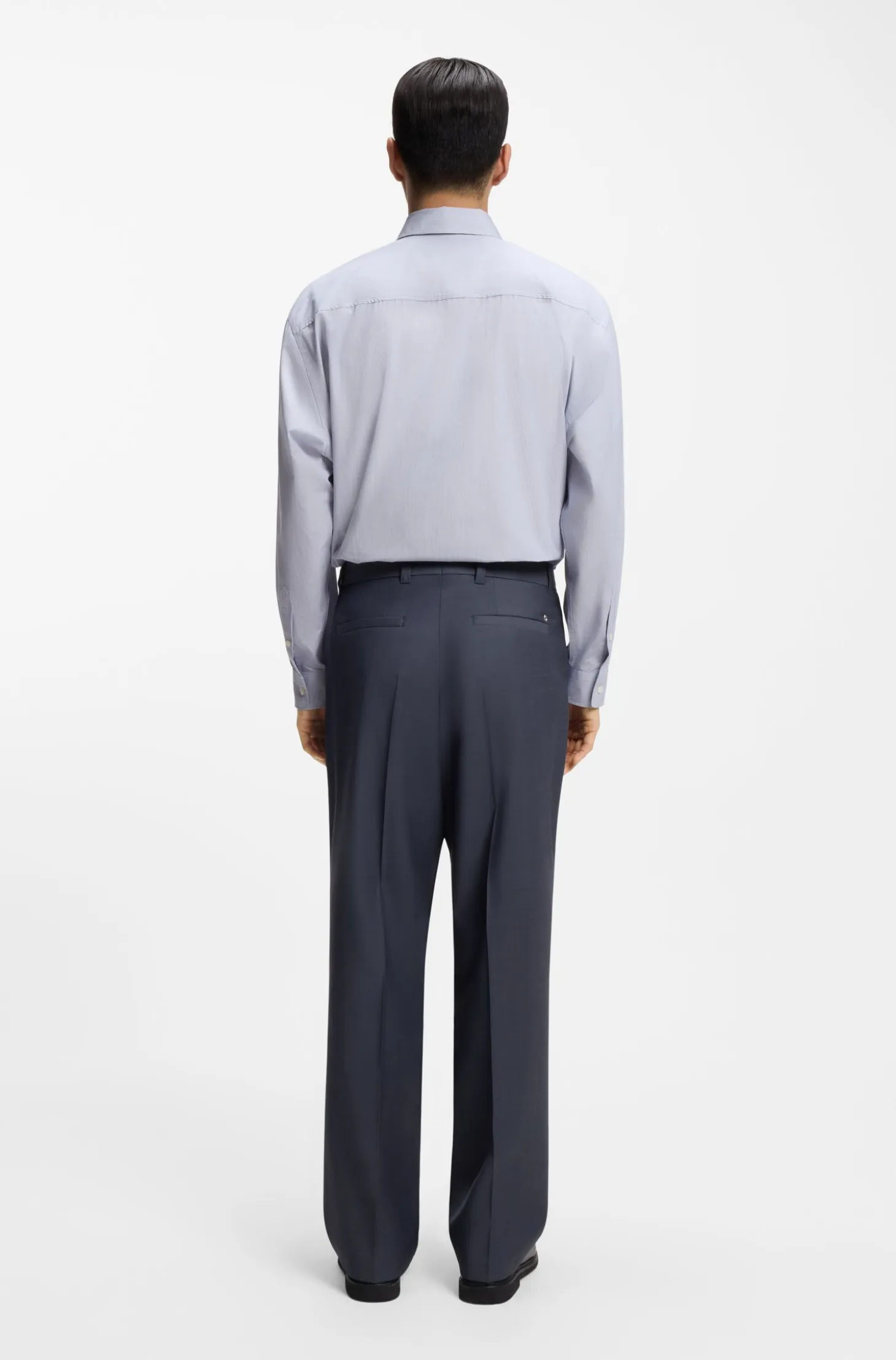 Tapered-fit trousers in micro-patterned virgin wool