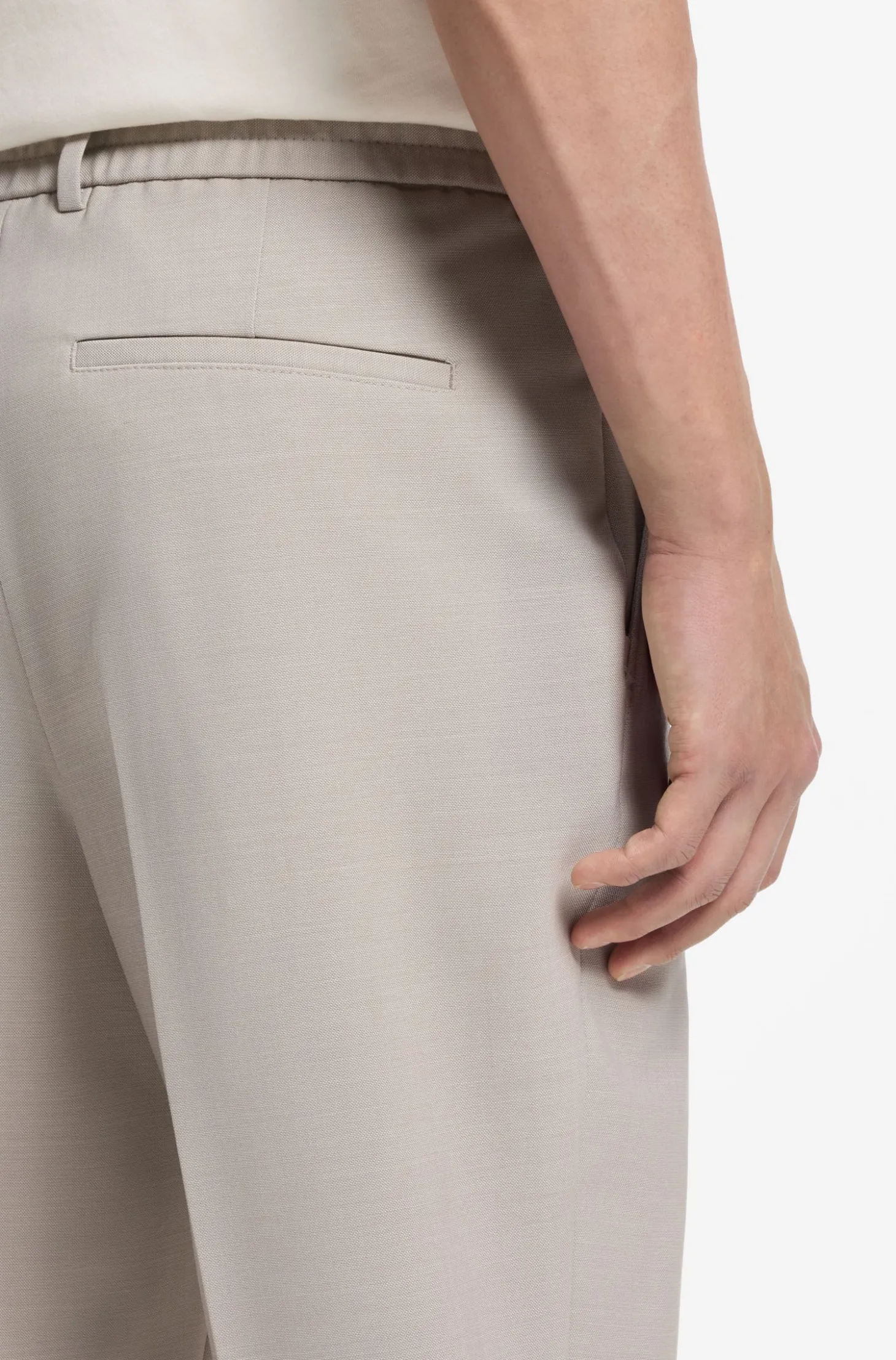 Tapered-fit trousers in micro-patterned virgin wool