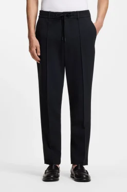 Tapered-fit trousers in performance-stretch fabric
