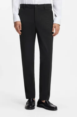 Tapered-fit trousers in stretch seersucker