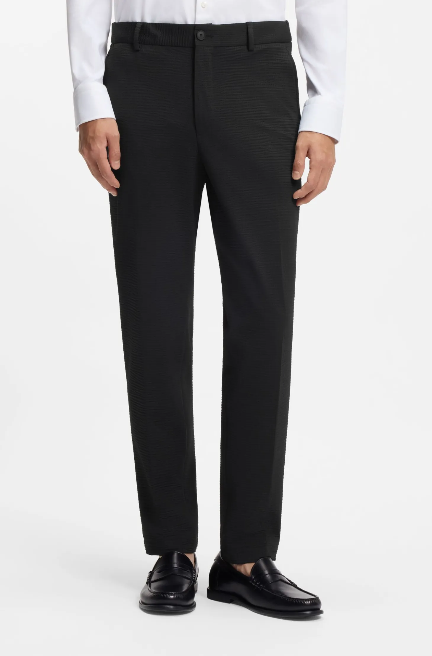 Tapered-fit trousers in stretch seersucker