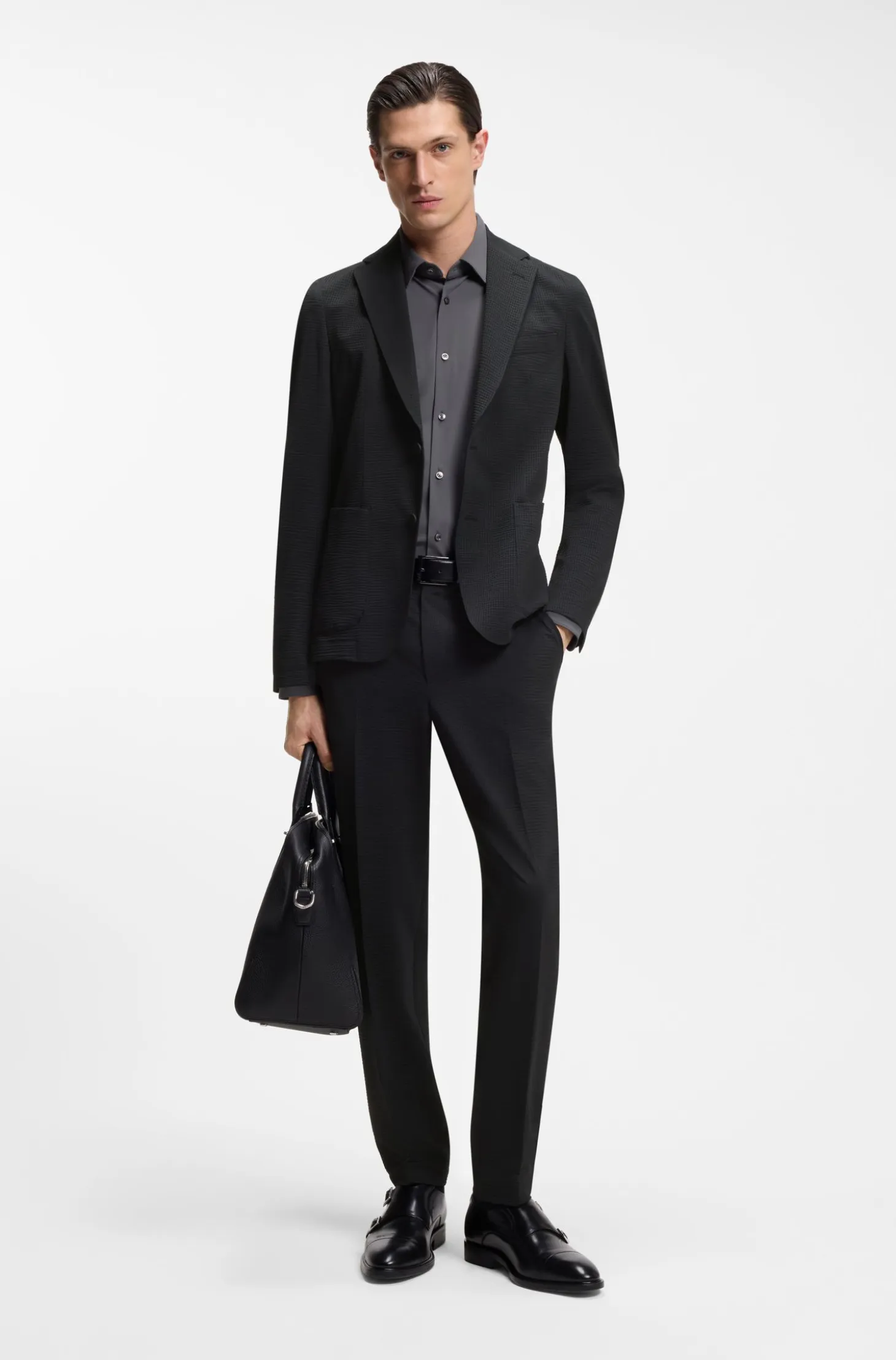 Tapered-fit trousers in stretch seersucker