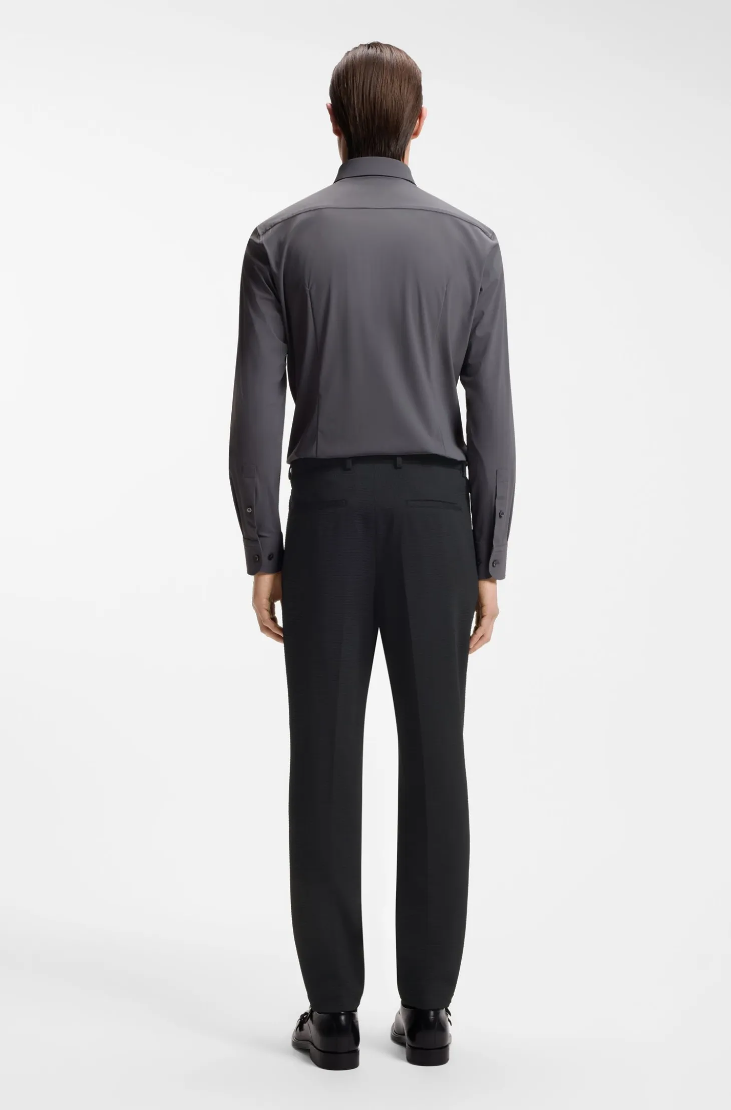 Tapered-fit trousers in stretch seersucker