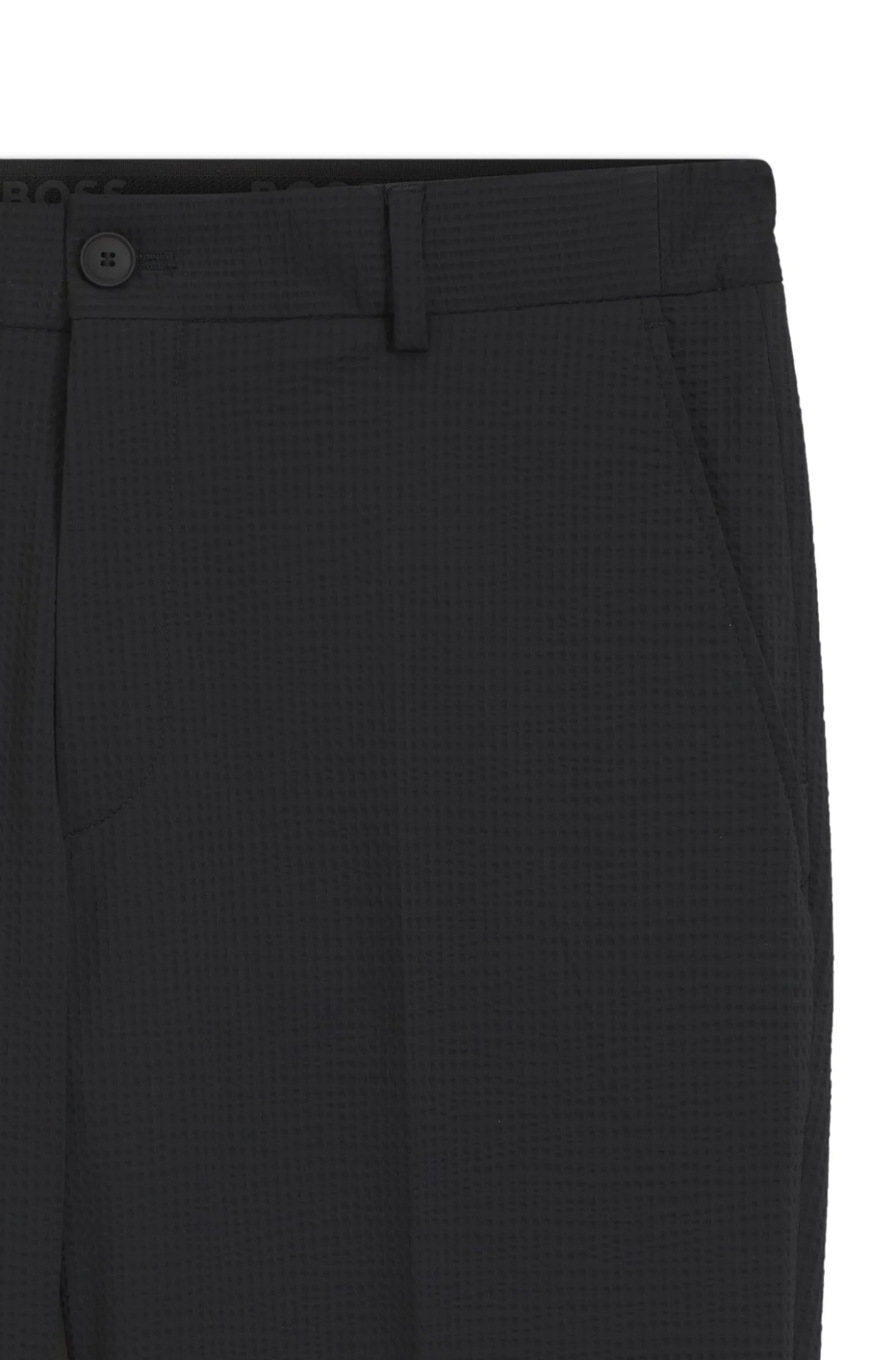 Tapered-fit trousers in stretch seersucker