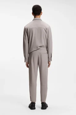 Tapered-fit trousers in waffle-structured stretch fabric