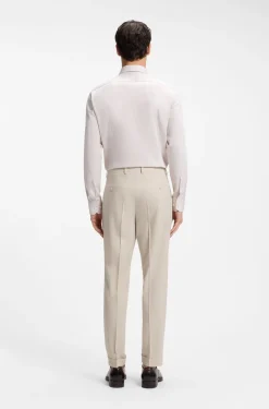 Tapered-fit trousers in wool-blend seersucker fabric