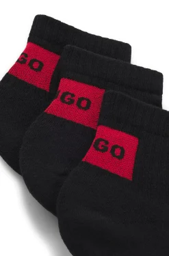Three-pack of ankle socks with red logo labels