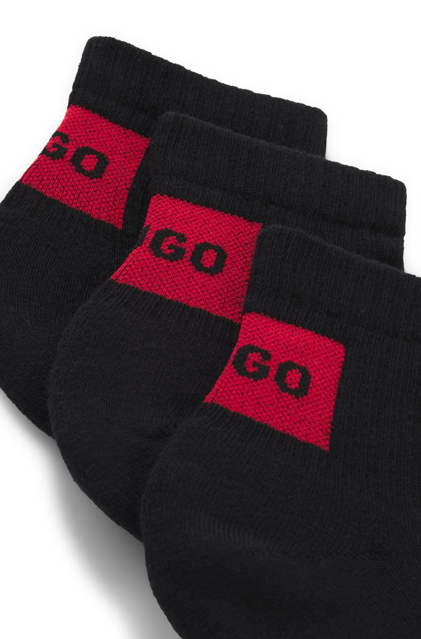 Three-pack of ankle socks with red logo labels