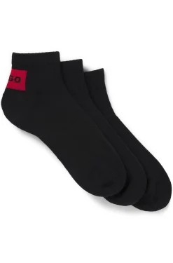 Three-pack of ankle socks with red logo labels