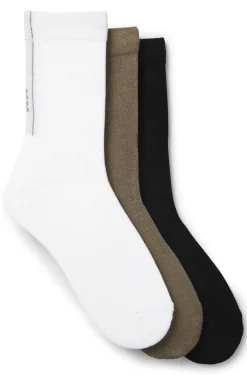 Three-pack of regular-length socks with structured tape
