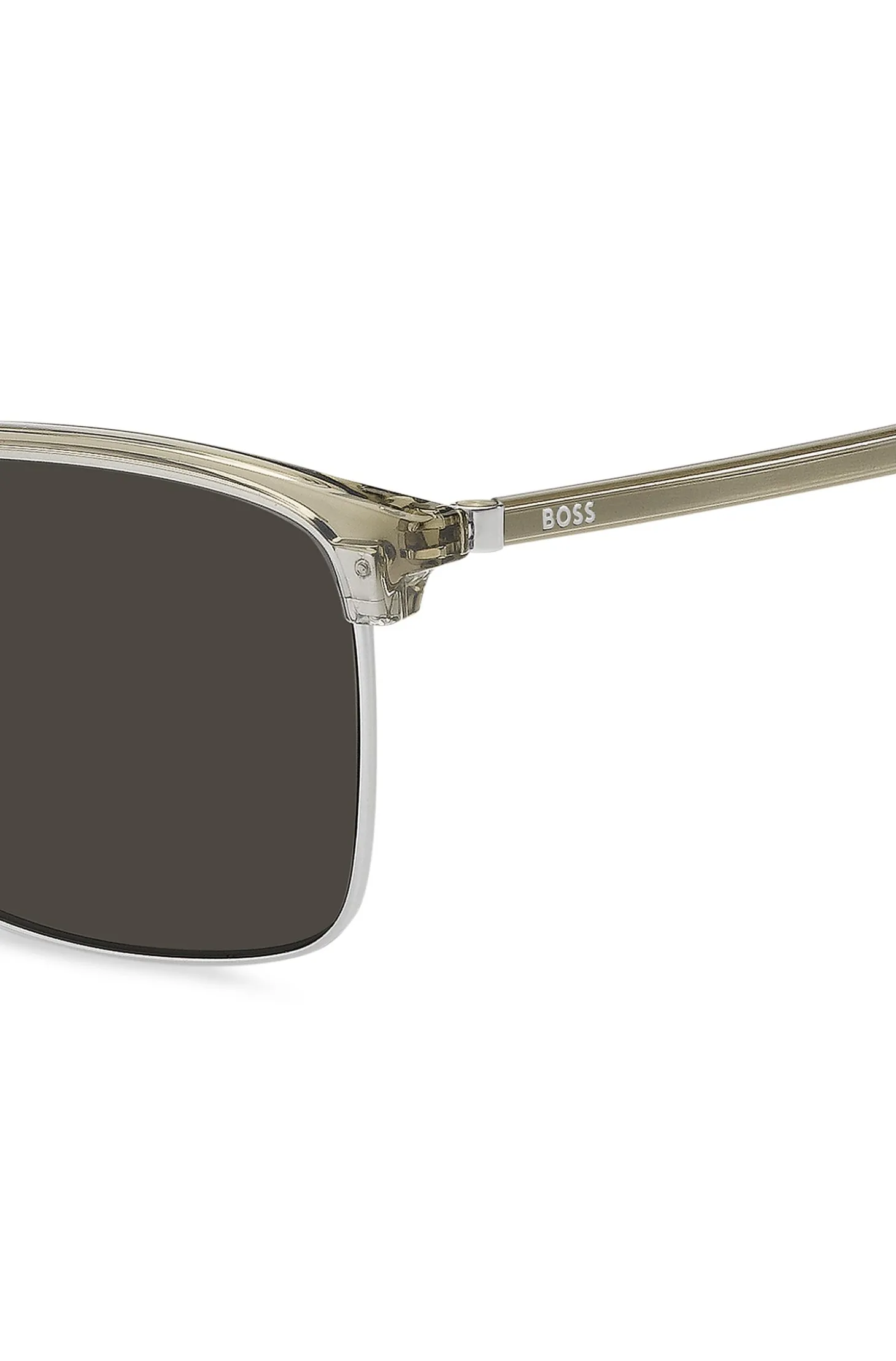Titanium-temple sunglasses with lasered-engraved logos
