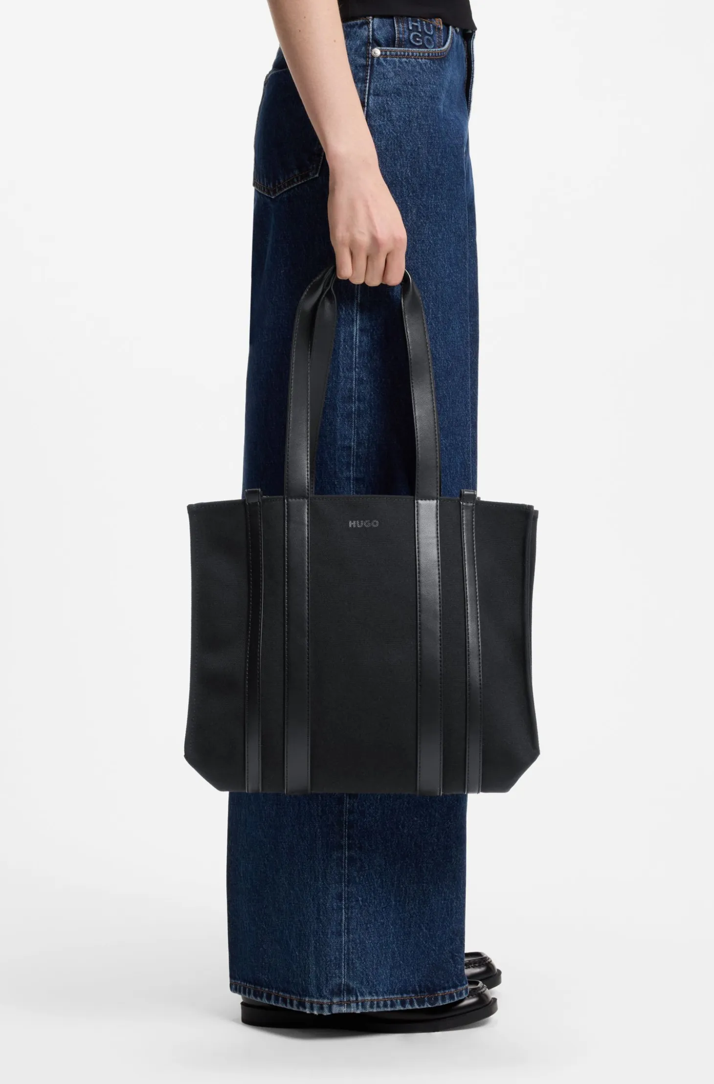 Tote bag with gold hardware and printed logo