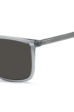 Transparent-blue sunglasses with temple logo